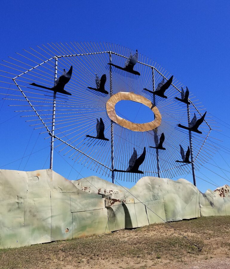 Geese in Flight sculpture by C. Suthorn, licensed under CC BY-SA 3.0, via Wikimedia Commons.